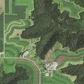 Man falls from tractor, possibly dislocates knee