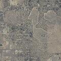Grass fire near structures on Southeast Yaqui Road