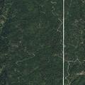 Two-acre wildland fire near structures in Ola