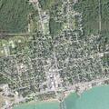 Officer stops silver Jeep at Tawas Bay Pizza