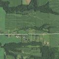 Vehicle and skid steer crash in Holland Town