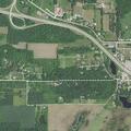 Report of red pickup swerving on roadway