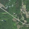 Second-alarm brush fire near US-131 exit on M-115