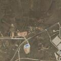 Vehicle stuck in soft ground at landfill site