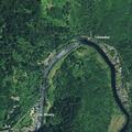 Man pushes spouse and fires shotgun toward river