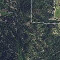 Small wood pile fire near homes in Cascade