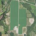 Vehicle damages hay field at rural property