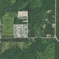 Gate blocking part of roadway near Camp Pugsley