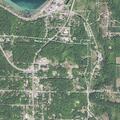 Child found unclothed on road, father located