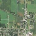 Person trapped upside down in skid loader at dairy farm