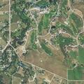 Vehicle stuck in creek on rural property