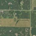 Farm combines damage mailbox on rural road