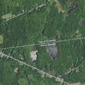 Woman experiencing chest pain near Route 374 in Saranac