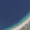 Woman floating on tube drifting near Peterson Beach