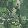 Tractor in ditch creates road hazard near highways