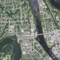 Woman with back pain and abnormal breathing near 1st Ave