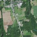 Unconscious elderly woman breathing near Chateaugay