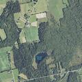 Fallen utility pole blocks road in Corinna