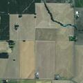 Suspicious person tampering with gate at property