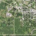 Fire damages structure behind Howard Lake home