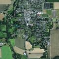 Car off road in field near McKee Road