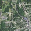 Loud music complaint in parking lot on Maple Street