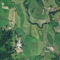 Farm tractor on fire in field near Cloverdale