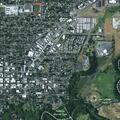 Man reported dumping trash and carrying rifle