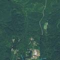 Brush fire near Beaver Lake threatens nearby home