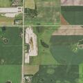 Person wandering in field near Highway 71