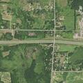 Person walking in I-94 median near County Road 172
