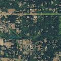 Person experiencing back pain near NE 275th Avenue