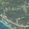 Male reported in woods behind a location on US-2; self-harm topic mentioned