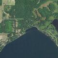 Tree on road blocks one lane at Devils Lake Road