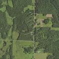 Barn fire spreading toward nearby woods and house