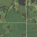 Truck trailer leaves road and rolls into field