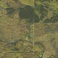Person with worsening back pain at cabin in McGrath