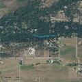 Grass fire near house on Middle Bear Creek Road