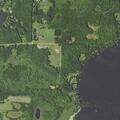 Brush fire near Farm Island Lake reaches power pole
