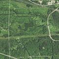Unauthorized tire fire near barn in Negaunee