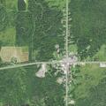Person with exposed bone injury in left arm in Bruce Crossing
