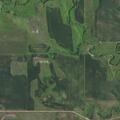 Combine on fire at rural farm property