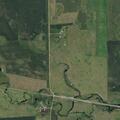 Injury crash involving flipped motorcycle in pasture
