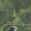 Large sinkhole blocking road near County Road 49