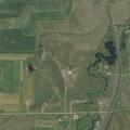 Hay bales burning near home in Mandan yard