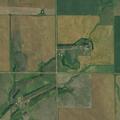 Grass fire near house at County Road 140 and 43rd