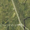 Grass fire jumps Erickson Road, spreading toward Highway 53