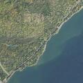Burning tree may fall on power lines near MN-61 in Two Harbors