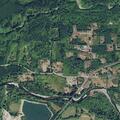 Couple arguing at river campsite in parked car