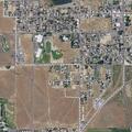 Backyard brush fire threatens home in Soap Lake